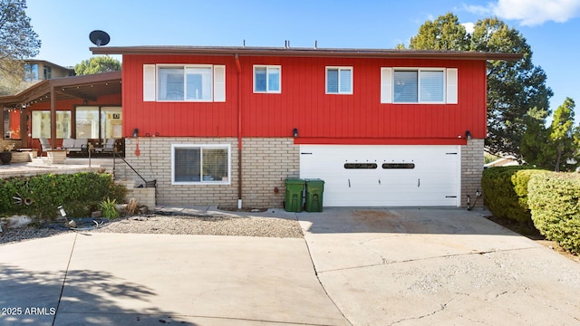 view of front of property with a garage