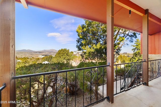 balcony featuring a mountain view