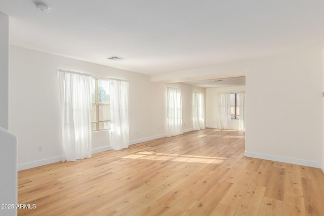 3064 E Michelle Way, Gilbert, AZ 85234 - unfurnished room with light wood finished floors and a smoke detector