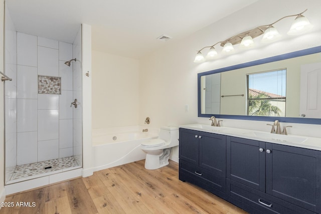 3064 E Michelle Way, Gilbert, AZ 85234 - bathroom featuring wood finished floors, a garden tub, double vanity, and a tile shower