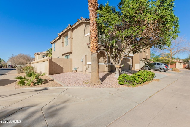 3064 E Michelle Way, Gilbert, AZ 85234 - view of home's exterior featuring stucco siding and a tile roof
