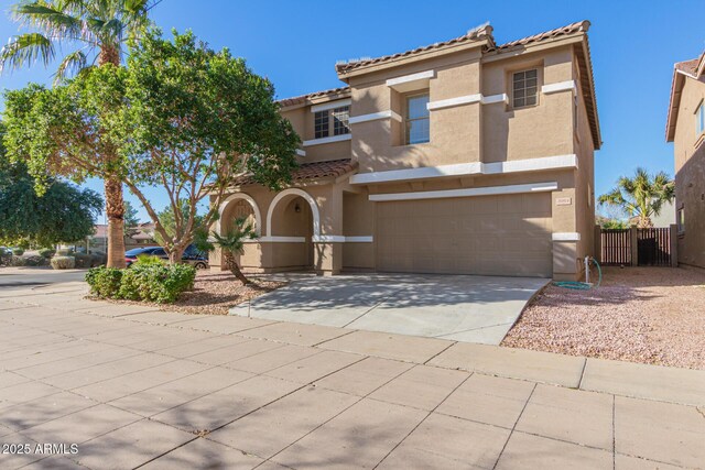 3064 E Michelle Way, Gilbert, AZ 85234 - mediterranean / spanish-style home featuring stucco siding, a tile roof, an attached garage, and concrete driveway