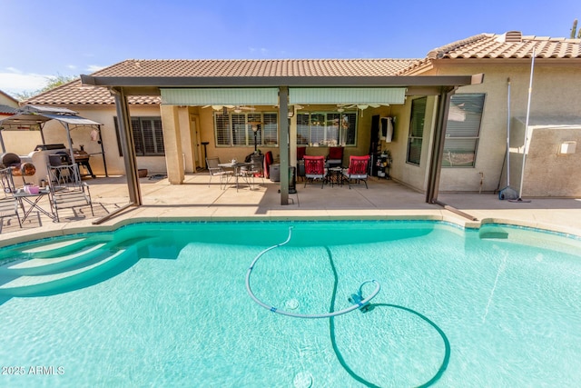 pool featuring a patio