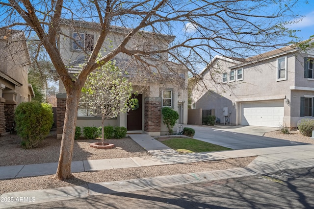 view of front of house with brick siding, stucco siding, driveway, and an attached garage