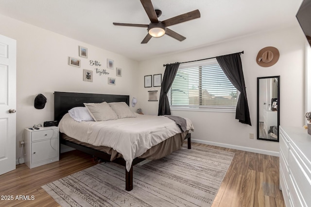 3447 E Dolphin Ave, Mesa, AZ 85204 - bedroom with light wood-style flooring and a ceiling fan