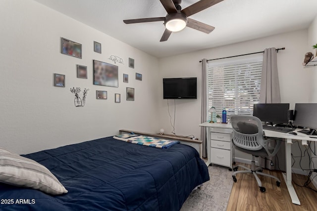 3447 E Dolphin Ave, Mesa, AZ 85204 - bedroom featuring light wood finished floors, a desk, and ceiling fan