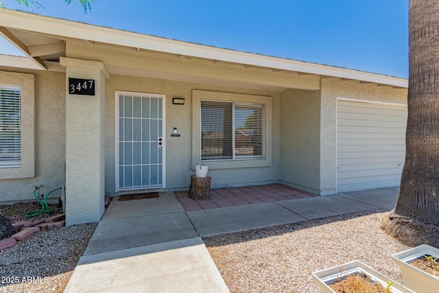 3447 E Dolphin Ave, Mesa, AZ 85204 - property entrance featuring stucco siding and an attached garage