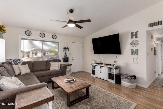 3447 E Dolphin Ave, Mesa, AZ 85204 - living area with a ceiling fan, light wood-style flooring, and vaulted ceiling