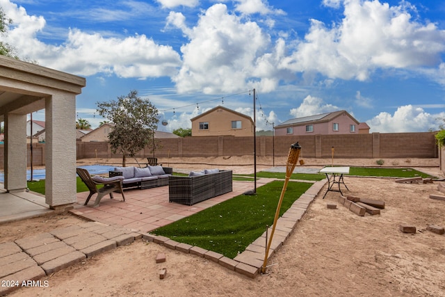 view of yard with a patio and an outdoor living space