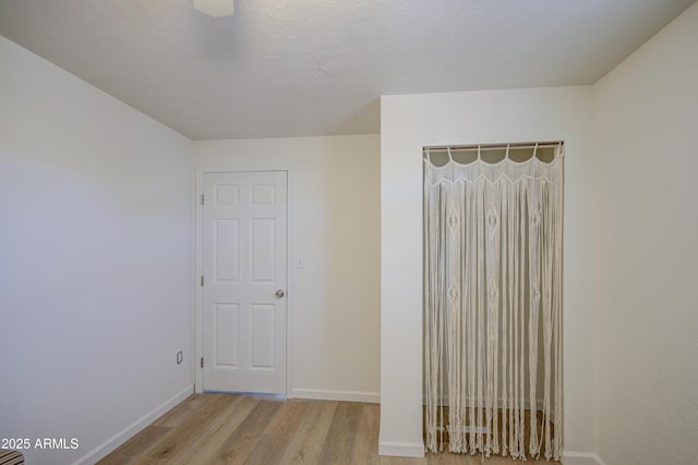 552 E 8th St, Florence, AZ 85132 - unfurnished room featuring light wood-style floors and baseboards