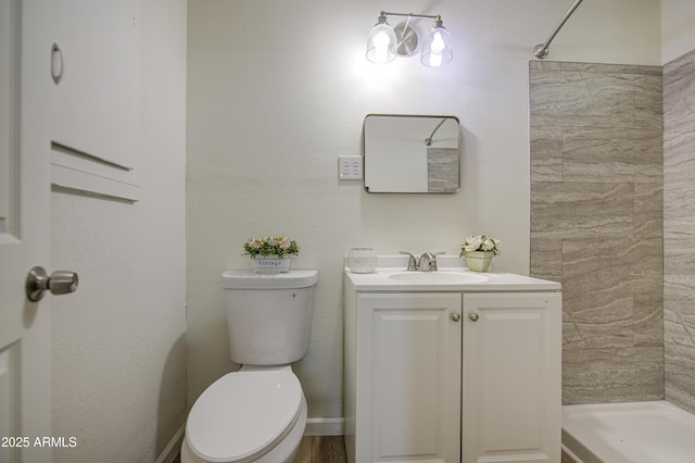 552 E 8th St, Florence, AZ 85132 - bathroom featuring vanity, a tile shower, and toilet
