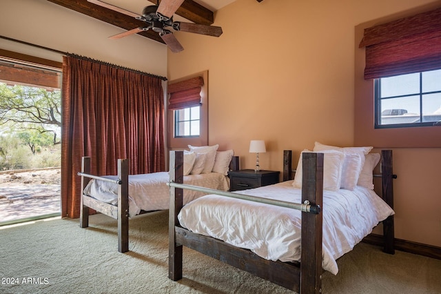 carpeted bedroom with access to exterior and ceiling fan