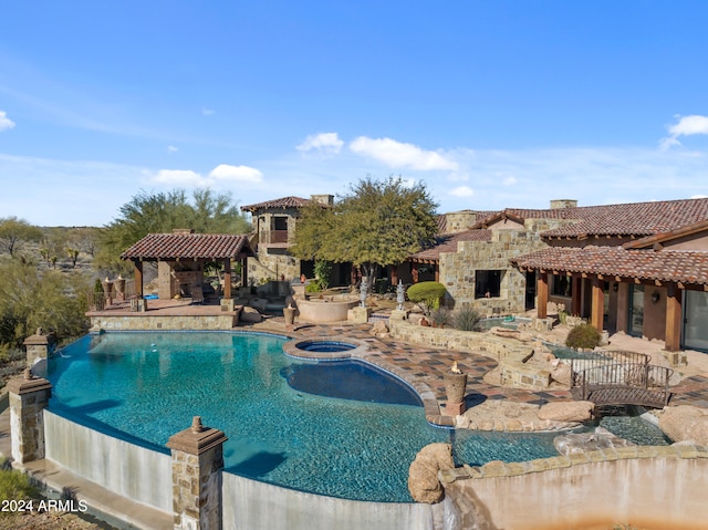 view of pool with a patio and a gazebo