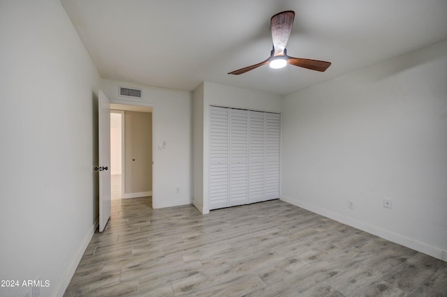 2122 E Radcliffe Dr, Tempe, AZ 85283 - unfurnished bedroom featuring light wood finished floors, a closet, and ceiling fan