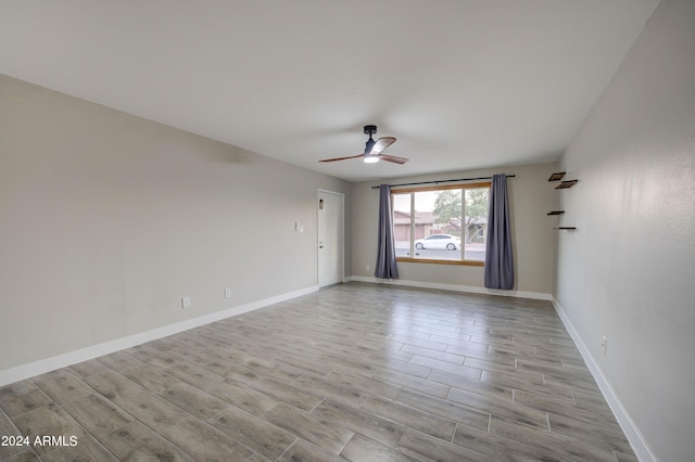 2122 E Radcliffe Dr, Tempe, AZ 85283 - spare room with a ceiling fan and wood finished floors