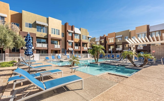 view of swimming pool featuring a patio area