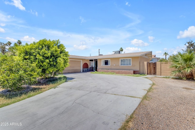 4632 W Marlette Ave, Glendale, AZ 85301 - ranch-style house featuring concrete driveway, an attached garage, and brick siding