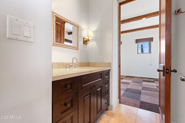 bathroom featuring tile patterned floors and vanity