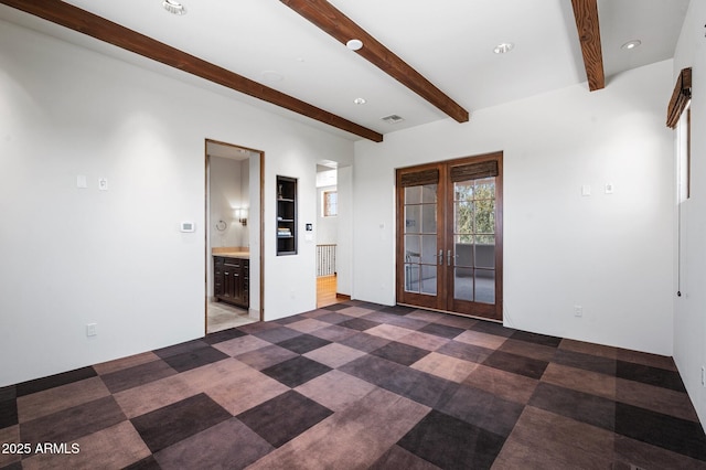 unfurnished room featuring visible vents, french doors, beam ceiling, and recessed lighting