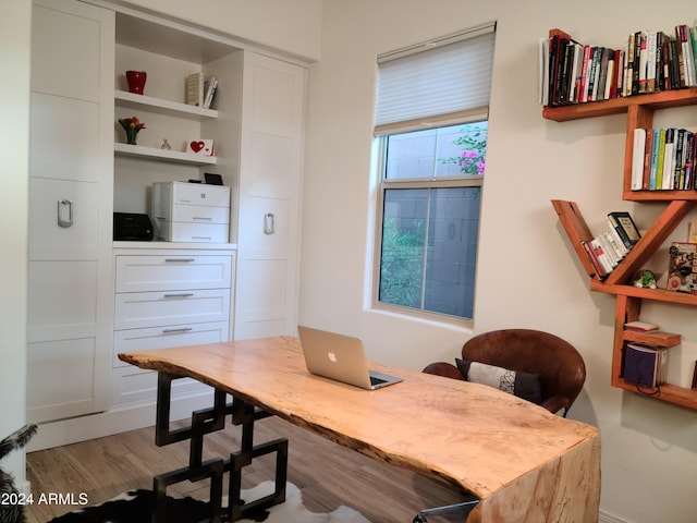 office area with light hardwood / wood-style flooring