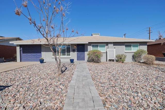 single story home with a garage