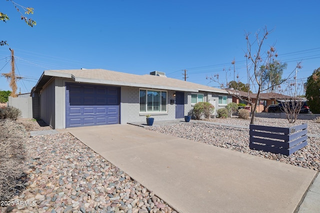 single story home featuring a garage