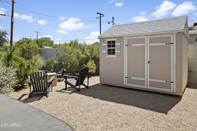 912 E Orchid Ln, Phoenix, AZ 85020 - view of shed with an outdoor fire pit