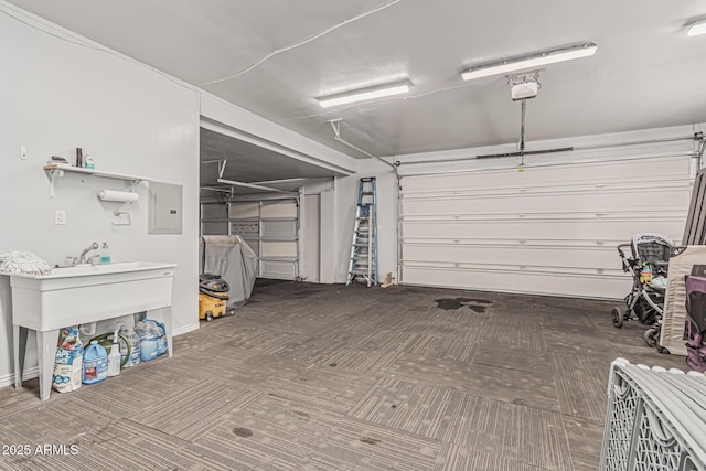 garage featuring a garage door opener and electric panel