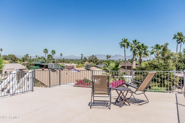 view of patio / terrace with a mountain view