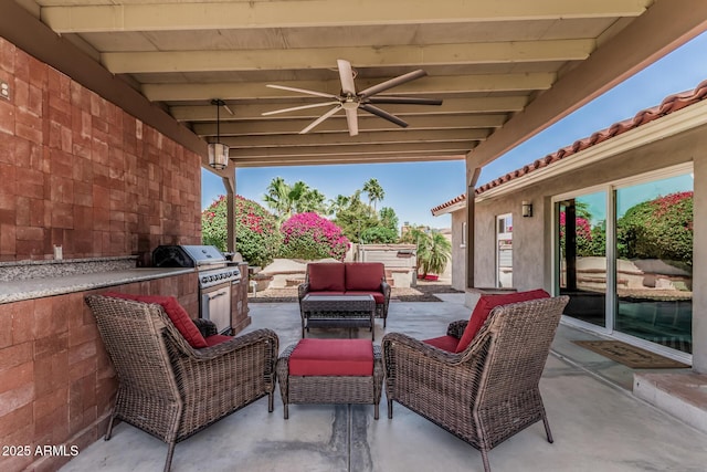view of patio / terrace with exterior kitchen, ceiling fan, and outdoor lounge area