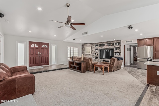 living area with recessed lighting, ceiling fan, visible vents, and lofted ceiling