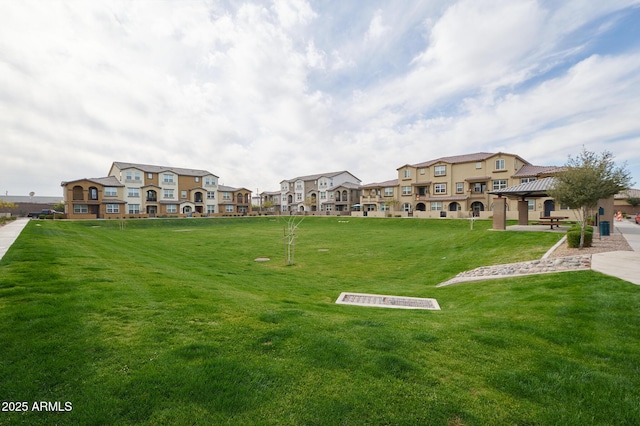 view of community with a gazebo and a lawn