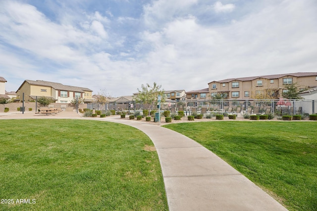 view of community with a lawn