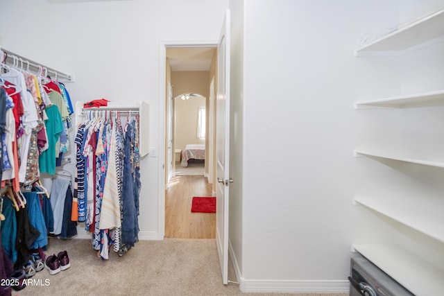 6317 E Beckett Trl, Prescott Valley, AZ 86314 - spacious closet with carpet floors and arched walkways