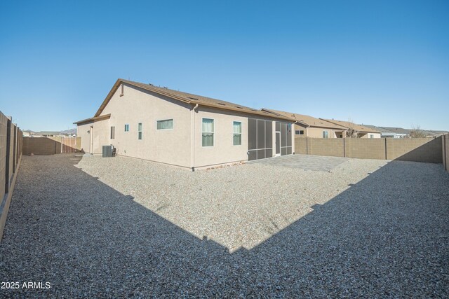 6317 E Beckett Trl, Prescott Valley, AZ 86314 - rear view of property with a patio area, a fenced backyard, central AC, and stucco siding