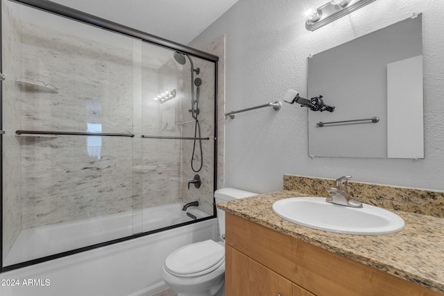 full bathroom featuring toilet, vanity, and combined bath / shower with glass door