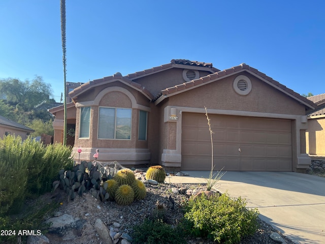 view of front of home featuring a garage