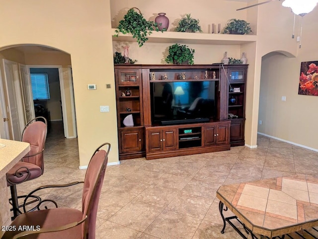 living room with ceiling fan