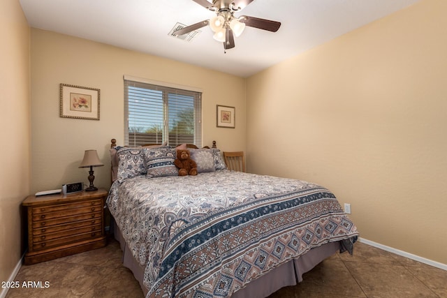 bedroom featuring tile patterned flooring and ceiling fan