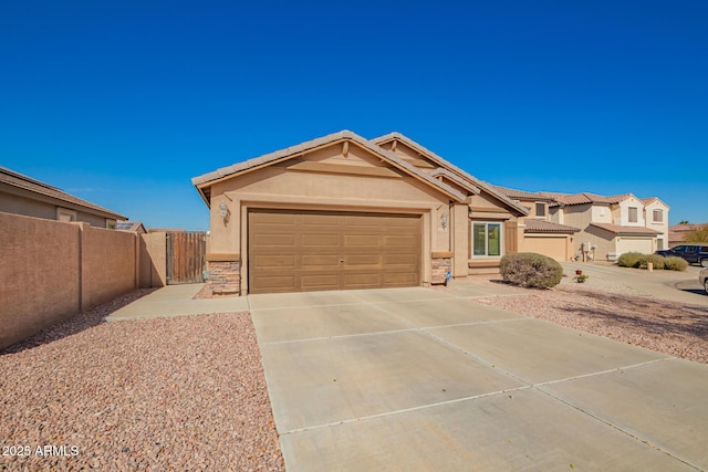 ranch-style home featuring a garage