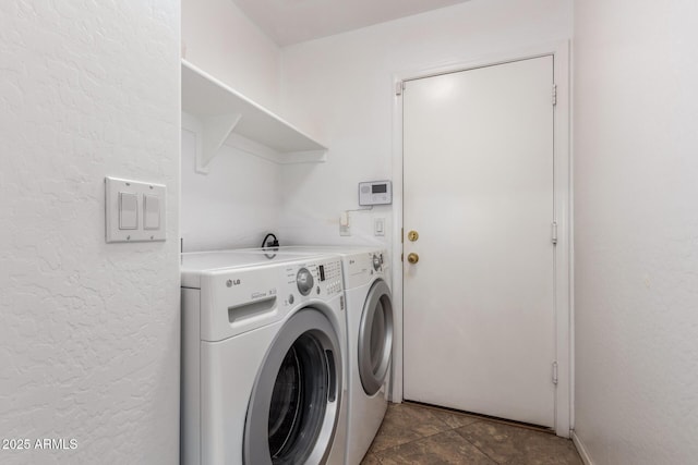 washroom featuring independent washer and dryer