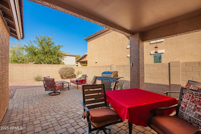 view of patio with area for grilling