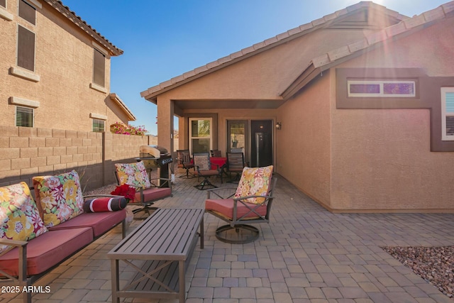 view of patio featuring area for grilling and an outdoor living space