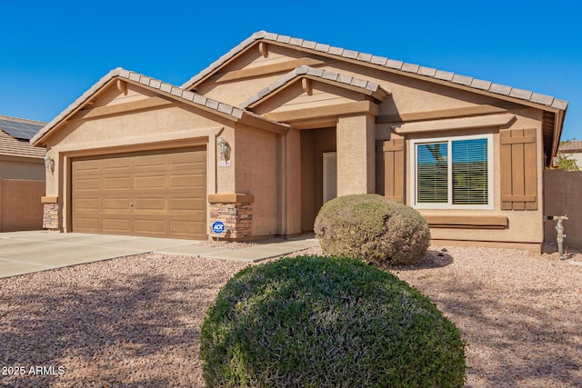 view of front of property with a garage