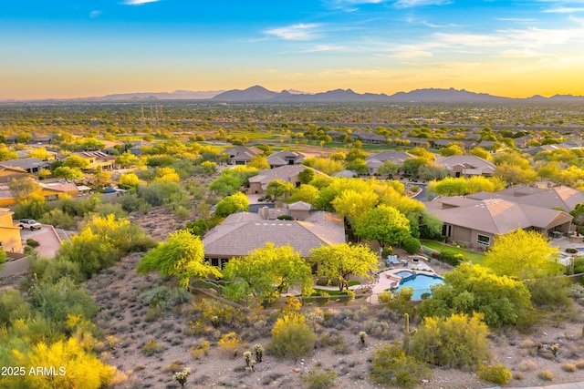 birds eye view of property featuring a mountain view and a residential view