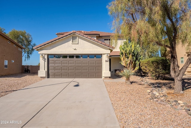 view of front of home with a garage