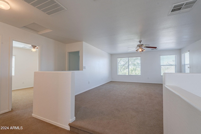 unfurnished room with carpet floors