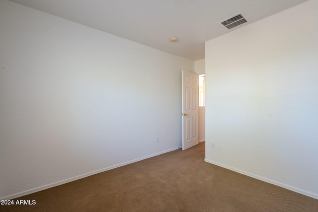 empty room featuring carpet