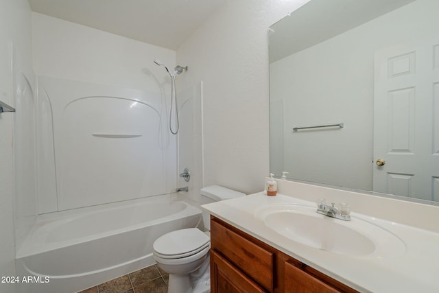 full bathroom with shower / tub combination, vanity, toilet, and tile patterned floors