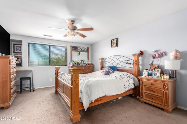 6528 S 258th Dr, Buckeye, AZ 85326 - bedroom featuring light colored carpet, baseboards, a ceiling fan, and visible vents